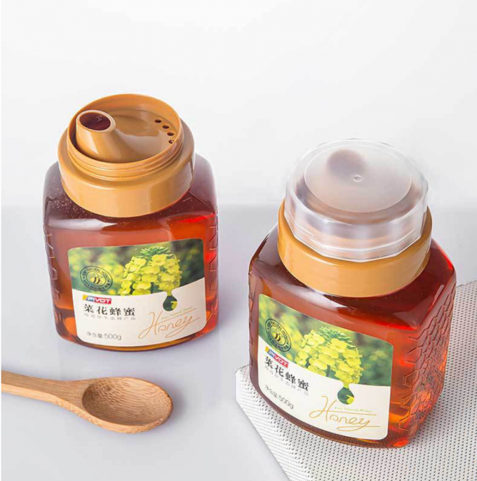 de Plastic Samenpersbare Kruiken van 500g 700g Honey Plastic Beverage Bottles Reusable 0